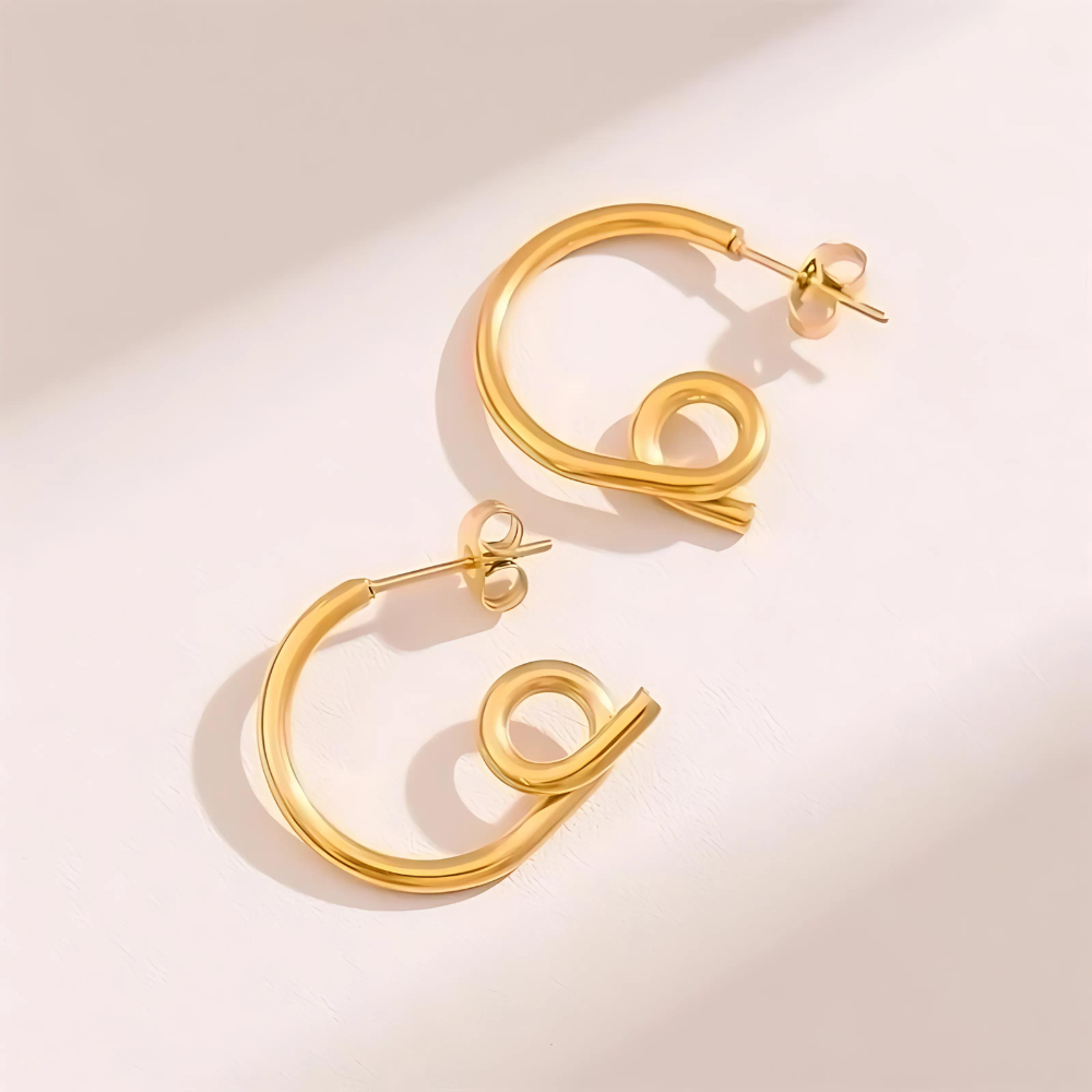 Nouille Ohrringe Gold